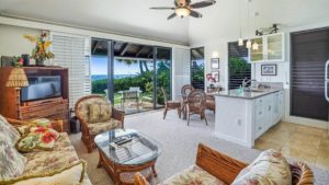 The living room of unit 200 at Kiahuna Plantation, beachfront condo rental in Kauai