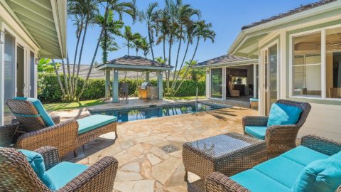 A view of the pool and barbecue in the courtyard of Kilohana at Poipu, a private vacation rental
