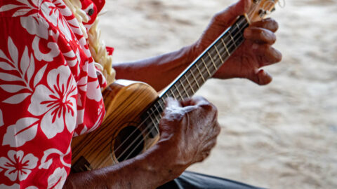 A man playing live ukulele music on Kauai