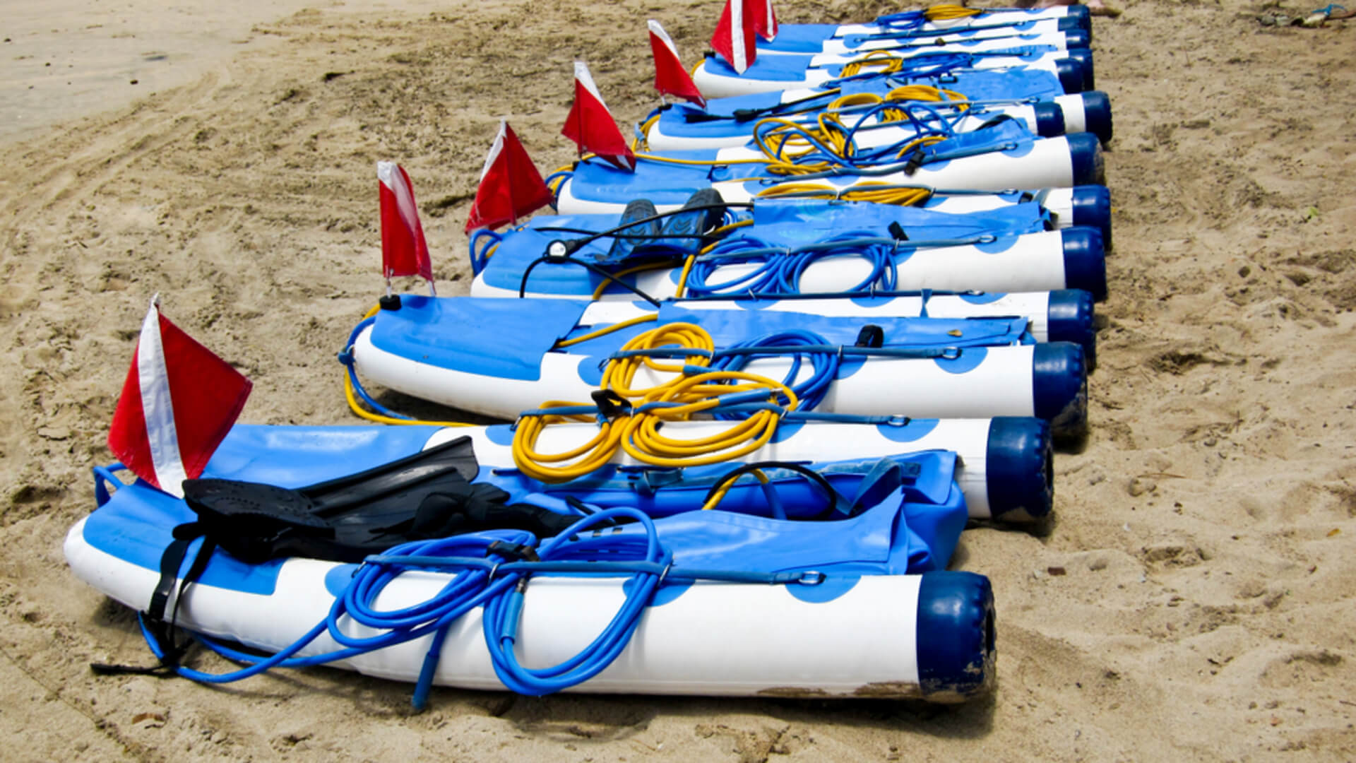 SNUBA gear set up on a beach in Kauai