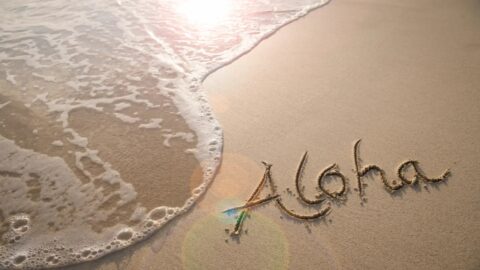 Aloha written in the sand, one of the most common Hawaiian words
