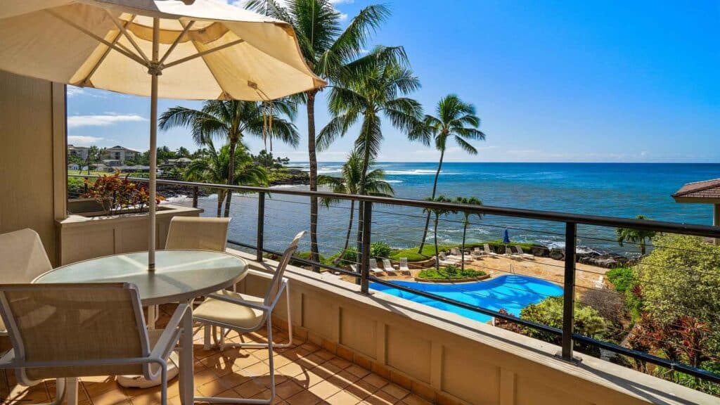 A view of the pool and the ocean from the lanai at Whalers Cove #230