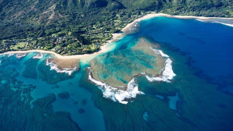 An aerial view of the shallow reef off of Shipwreck Beach in Kauai