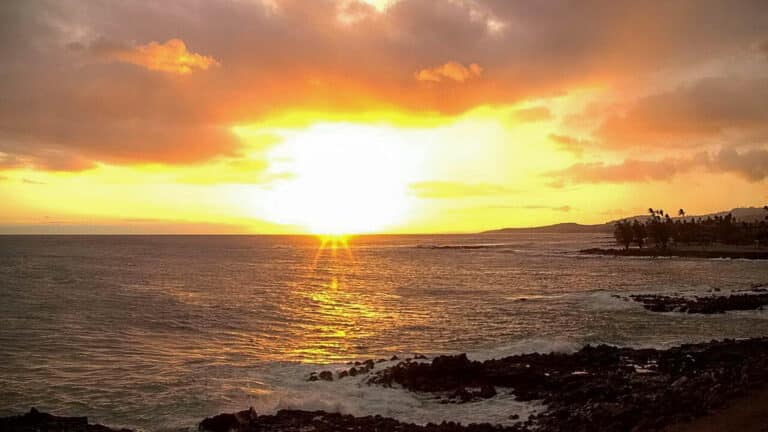Sunset over Kauai's South Shore as the island continues recovering from Hurricane Lowell.